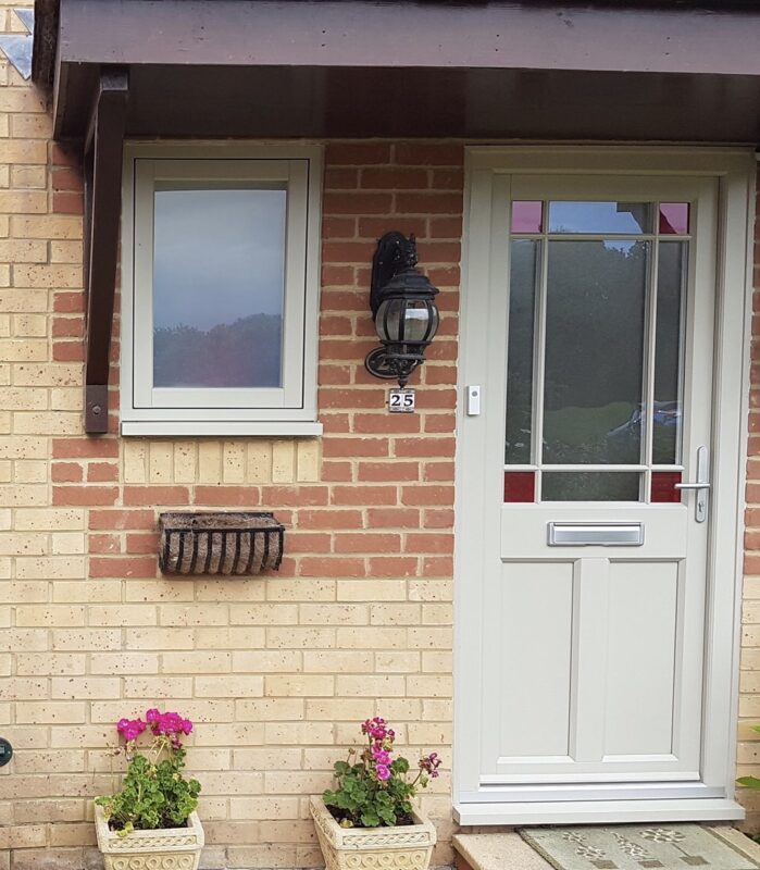 home entrance with timber alternative door