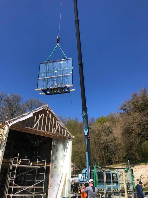 crane holding mirror for the right placement